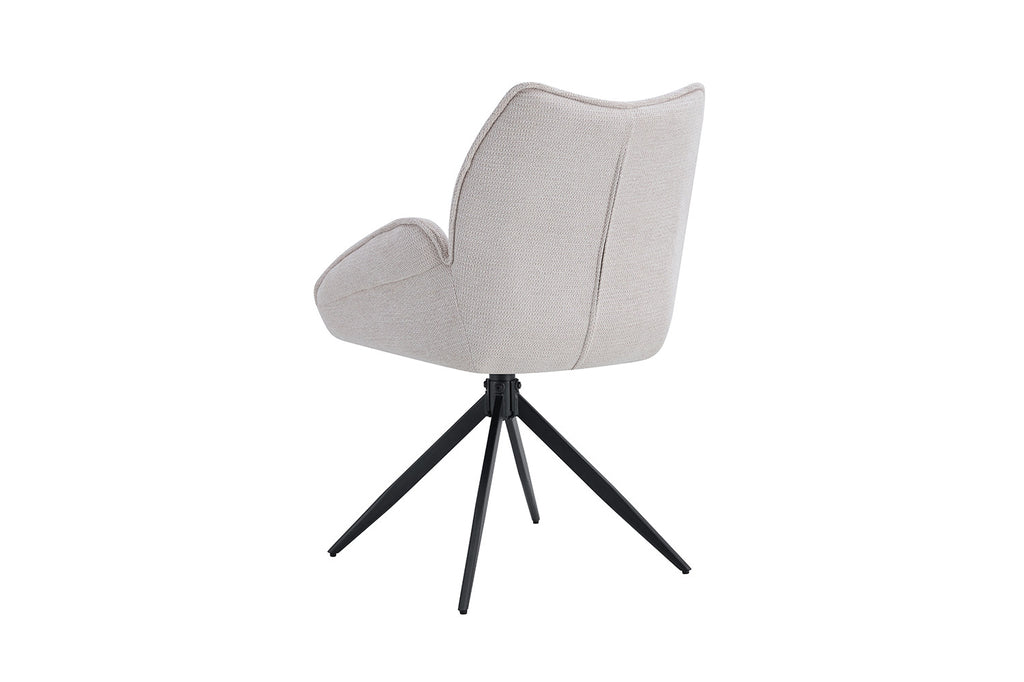 Stoel 'Mahi' Draaibaar tot 0, met witte bekleding en zwarte poten, ideaal voor moderne interieurs. Verkocht in sets van twee bij Furndaily.