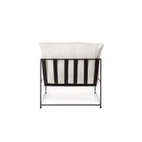 Fauteuil Elton - Wit Teddy Stof met zwart metalen frame, minimalistisch design, zachte zitting met stiksels, perfect voor modern interieur. Zithoogte 49 cm.