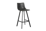 Barkruk 'Ozan' PU Zwart, industrieel design met zwarte metalen poten en ergonomische zitting, ideaal voor moderne interieurs en bartafels.