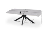 Salontafel 'Apollo' 130 cm, Deens ovaal ontwerp met metalen structuur en stenen blad, weergegeven met afmetingen en symbolen op een witte achtergrond.