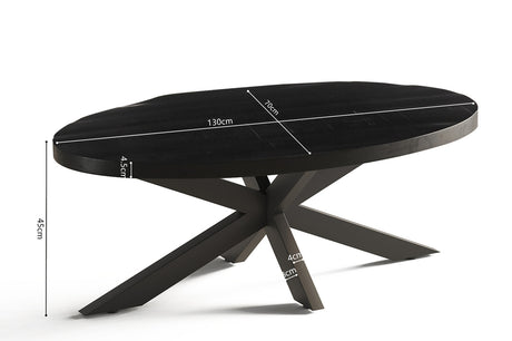 Salontafel 'Madeira' Ovaal in zwart Mango hout met metalen structuur, toont een zwart tafelblad met witte markeringen en een metalen poot.