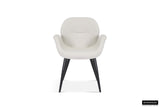 Stoel 'Maxim' Stof Beige met zwarte poten, inclusief armleuningen, verkocht per twee, perfect voor elke kamer in huis.