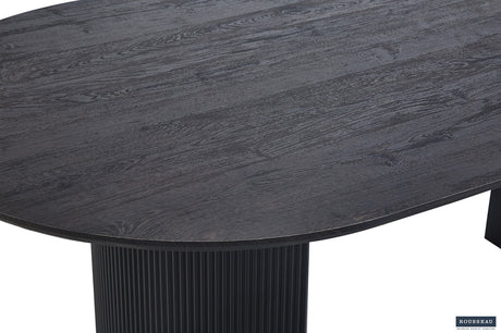 Tafel 'Lagos' 200 cm ovaal decor donkerbruin, MDF-structuur met mat oppervlak, zwart cilindrische voet en 3D-papier top.