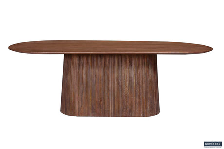 Tafel 'Miguel' 230 cm ovaal van lichtbruin massief mango hout, close-up op het houten oppervlak. Perfect als stijlvolle houten koffietafel.