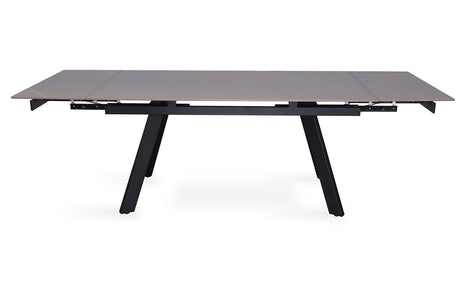Uitschuifbare tafel 'Hera' 160-240 cm, rechthoekig, met zwart metalen frame en steenen blad, geschikt voor diverse interieurstijlen.